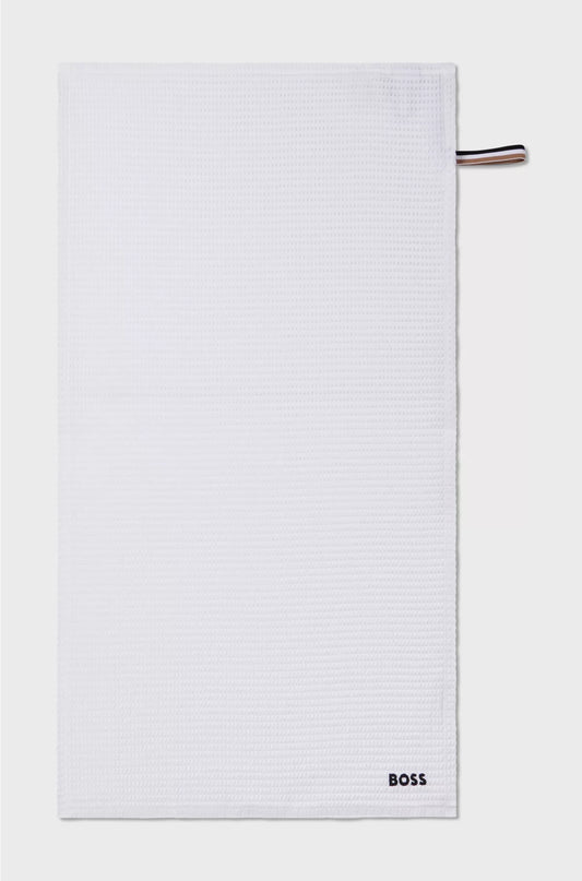 HONEYCOMB-COTTON HAND TOWEL WITH SIGNATURE-STRIPE STRAP