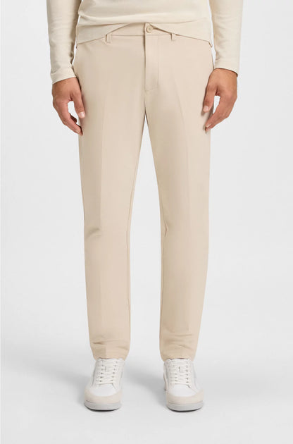 SLIM-FIT CHINOS IN EASY-IRON FOUR-WAY STRETCH FABRIC