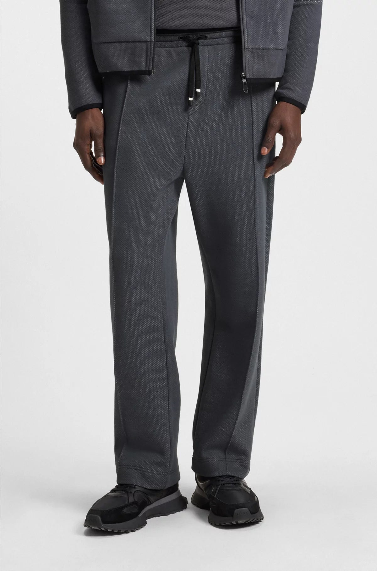 RELAXED-FIT TRACKSUIT BOTTOMS IN QUILTED JACQUARD