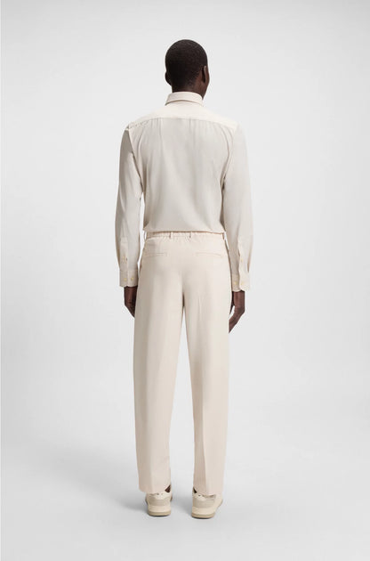 RELAXED-FIT TROUSERS IN WATER-REPELLENT STRETCH FABRIC