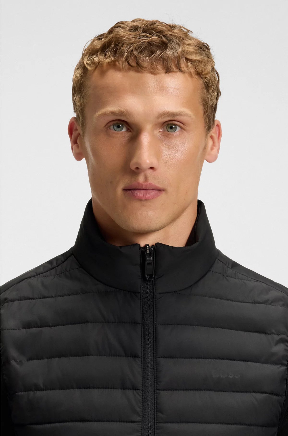 WATER-REPELLENT GILET WITH DECORATIVE REFLECTIVE ACCENTS