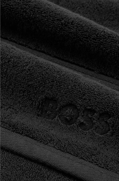 COTTON GUEST TOWEL IN BLACK WITH EMBROIDERED LOGO