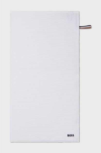HONEYCOMB-COTTON HAND TOWEL WITH SIGNATURE-STRIPE STRAP
